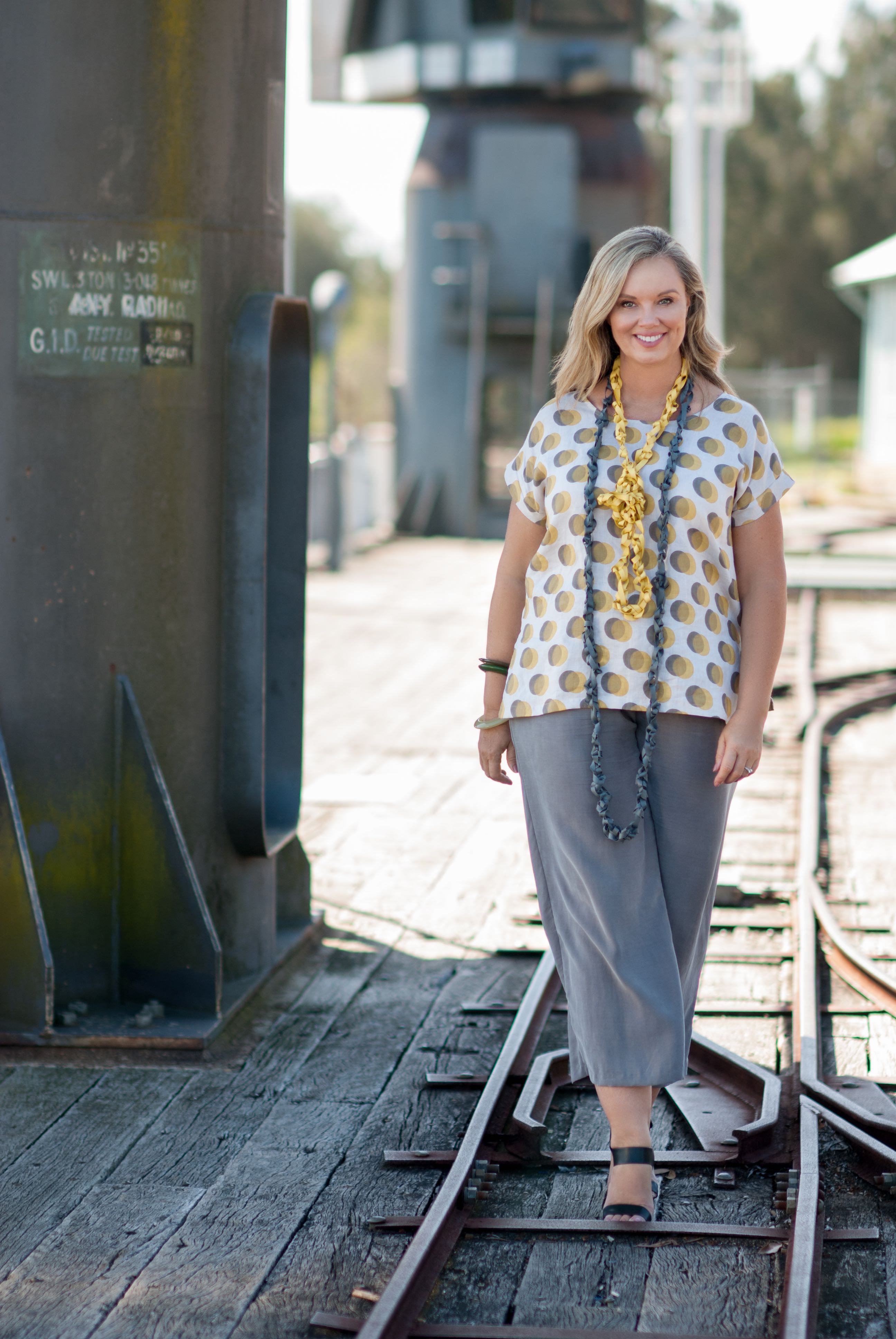 Tina wearing linen top M